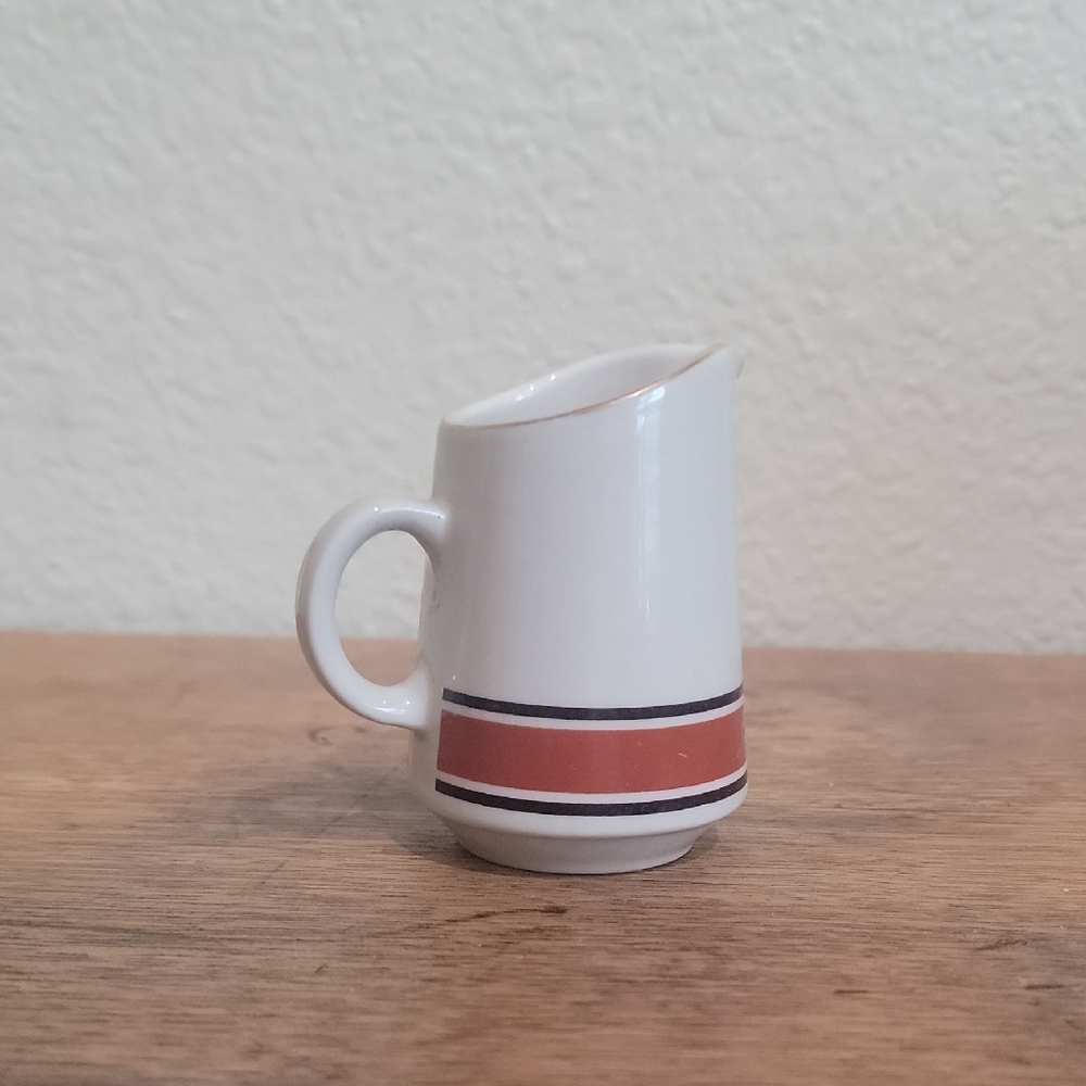 Elegant Striped Ceramic Pitcher